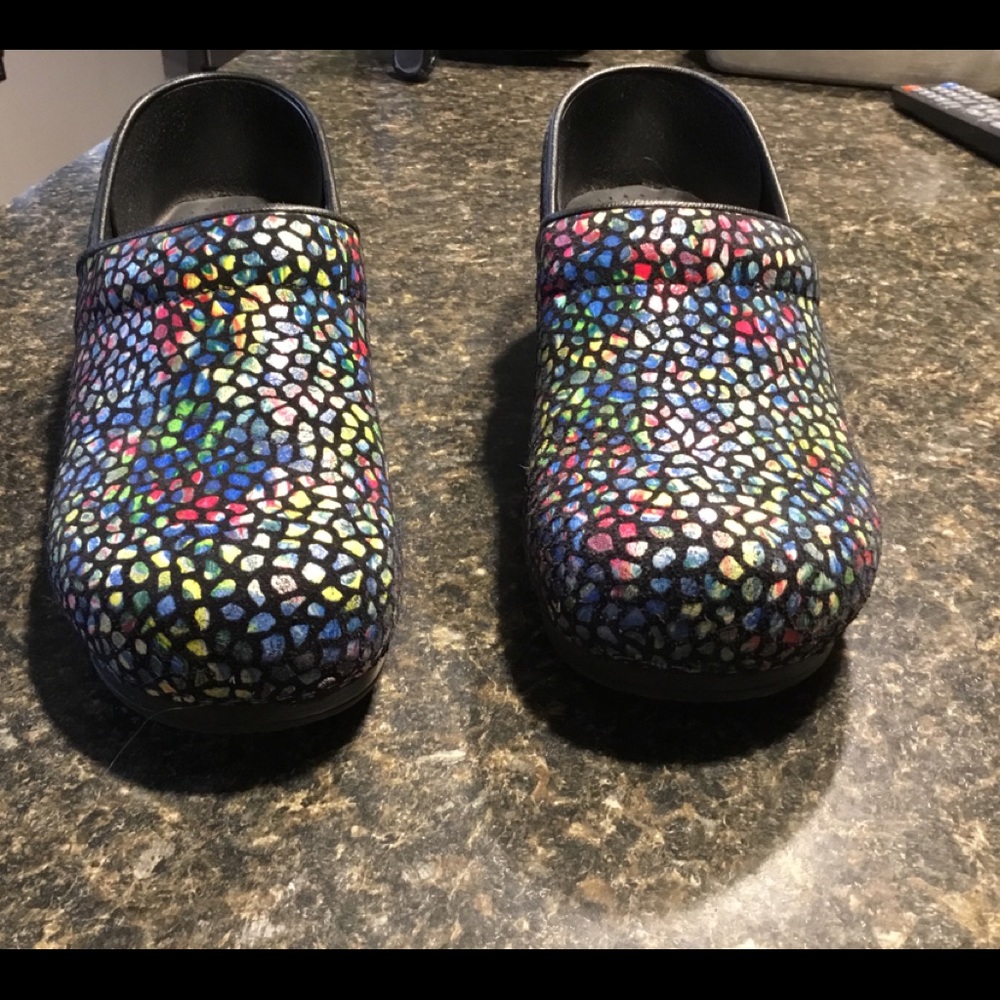 In Like New Condition Sanita Clogs